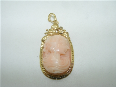 Beautiful Vintage carved face Angel skin coral and diamond pendant