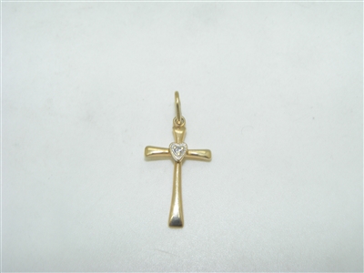 Diamond cross pendant with a heart
