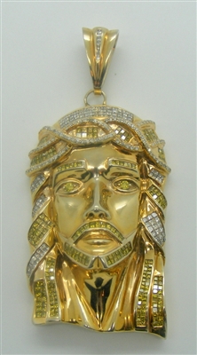 WHITE AND YELLOW DIAMOND JESUS HEAD. 14K YELLOW GOLD