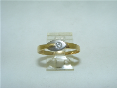 18k yellow and white gold single diamond ring
